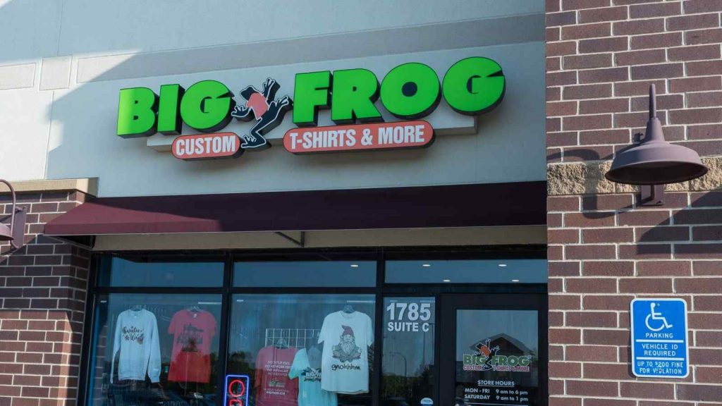 A Big Frog Franchise Store With A Sign Outside.